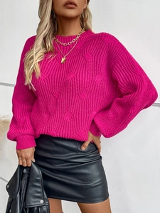 Women's chunky cable knit sweater in vibrant rose red with a stylish round neck