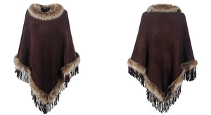 Detail of knit poncho with faux fur trim and long fringe tassels in dark brown