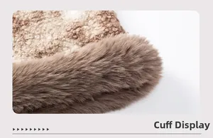 Detail of knit poncho sleeve featuring luxurious faux fur trim and textured leopard fabric