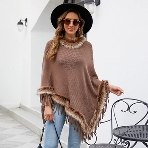 Women's brown knitted poncho with faux fur trim and tassel fringe for autumn winter
