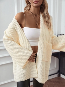 Gilet surdimensionné beige en maille gaufrée avec épaules tombantes et poches