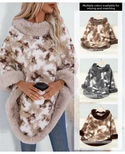 Detail view of tie-dye knit poncho with thick faux fur collar in khaki, grey and coffee