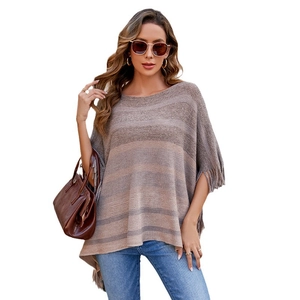 Women's striped knit poncho cape with tassel hem and casual oversized silhouette