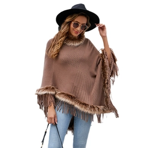 Chic brown knitted poncho with faux fur trim and elegant tassels for autumn fashion