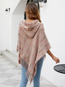 Rear view of hooded knit poncho with earth-tone stripes and thick fringe tassels