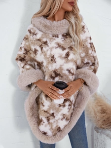 Women's leopard print knit poncho with warm faux fur collar and cozy winter texture
