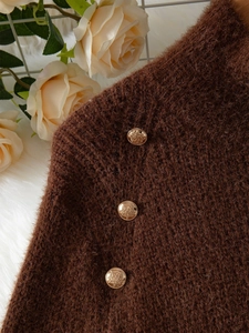 Brown buttoned knit sweater with plush texture and vintage gold crest buttons detail