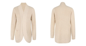 Detail of beige waffle knit cardigan featuring an open front design and functional pockets