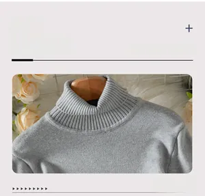 Detailed close-up of the ribbed collar on a cozy grey knit pullover sweater top