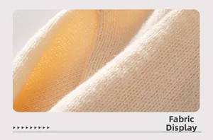 Vue macro détaillée de la texture du tricot crème doux et détails de maille fine