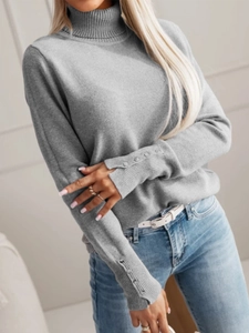 Elegant grey turtleneck knit sweater for women with button cuffs and ribbed collar details