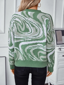 Back view of women's long sleeve sweater with green abstract marble knit pattern