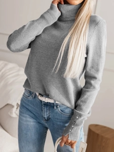 Elegant grey turtleneck knit sweater for women with buttoned cuffs for autumn and winter