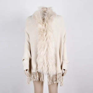 Elegant beige knit shawl with large faux fur collar and long fringe hem for autumn