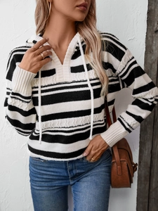 Women's black and white striped hooded knit sweater with drawstrings and casual long sleeves