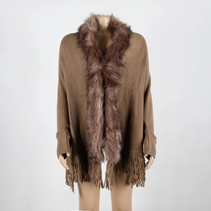 Brown knit poncho sweater with elegant faux fur collar and fringe tassels for winter wear