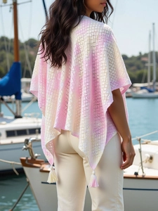 Pink and beige gradient crochet boho poncho with fringe details for summer vacation