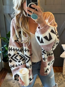 Chic oversized jacquard knit cardigan for women featuring pink and black geometric pattern