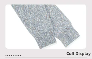 Detail of ribbed cuffs on blue and brown mixed knit cardigan with fine texture