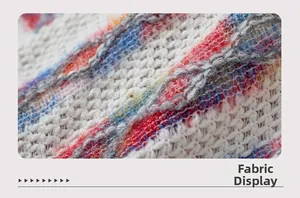 Macro shot of colorful knitted fabric with thick mixed-color yarns and soft texture