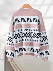 Oversized knit cardigan featuring pink and white geometric jacquard patterns and ribbed trims