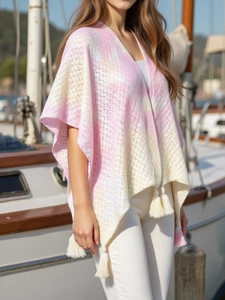 Pink and yellow crochet tassel poncho with hollow-out knit pattern for beach resort wear