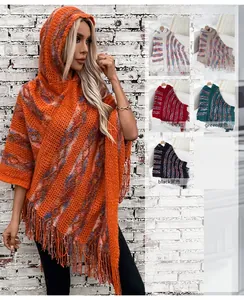 Detail of colorful striped hooded knit poncho with tassel fringe in various color options