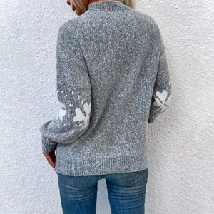 Women's Christmas knit sweater with snowflake sleeve patterns in blue melange yarn