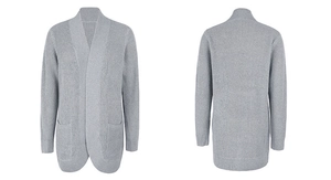 Detail of light gray chunky knit cardigan with curved open front and ribbed cuffs