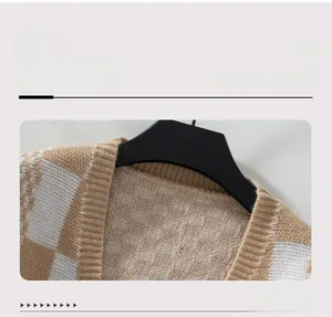 Detail of V-neckline and checkered knit texture on brown casual cardigan sweater