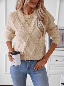 Women's loose beige crewneck sweater featuring diamond knit texture and casual style