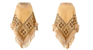 Detail of winter poncho with faux fur collar, snowflake pattern, and tassel hem fringe