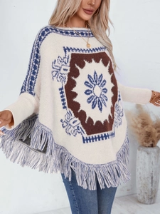 Bohemian knit poncho sweater with geometric floral patterns and fringe hem details