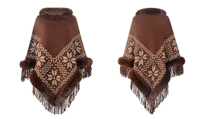 Close-up of brown knit poncho with snowflake patterns, faux fur collar and fringed hemline