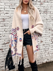 Bohemian Aztec knit cardigan with geometric patterns and long fringe hem for women