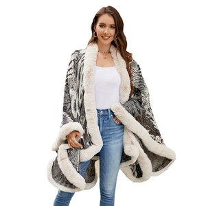 Grey knit poncho for women with peacock jacquard pattern and plush faux fur trim