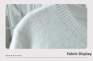 Detailed macro view of white zebra textured knit fabric with ribbed collar and soft finish