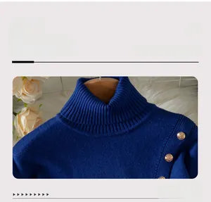 Close-up of royal blue knit sweater neckline with three decorative gold embossed buttons