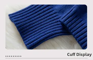 Detail view of ribbed knit cuffs on elegant navy blue long sleeve sweater for women