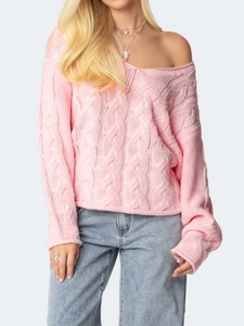 Pink cable knit sweater with off-shoulder V-neck and loose fit for a cozy autumn look