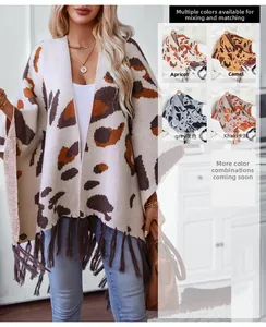 Detail view of leopard print knit poncho with fringe in apricot, camel, grey and khaki