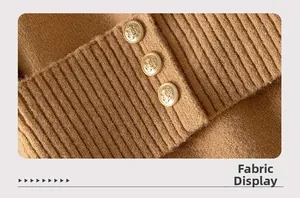 Detail of camel knit sweater featuring textured fabric and three vintage gold crest buttons