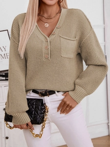 Retro V-neck waffle knit sweater for women with loose fit buttons and front pocket detail