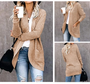 Detail view of beige waffle knit cardigan with side pockets and open front design