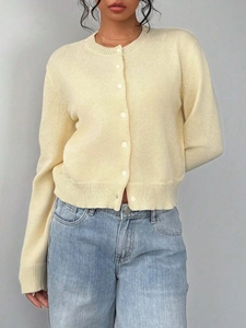 Women's cream yellow knit cardigan with crew neck and ribbed edges for casual autumn style