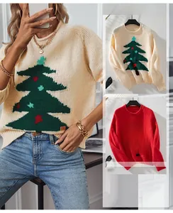 Detailed knit texture of Christmas tree sweater in apricot and festive red colors