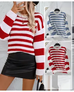 Detail of striped crew neck chenille sweater with drop shoulder design in blue and red