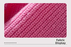 Detail of pink knit fabric showing soft texture and thick vertical ribbed pattern