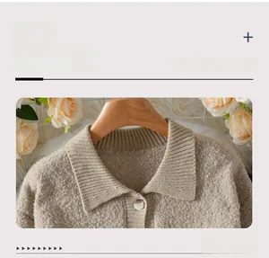 Detail of oatmeal knit cardigan showing polo collar and wood-textured button texture