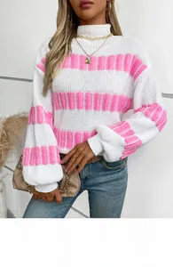 Detail of pink striped knit sweater with fuzzy texture and lantern sleeve style